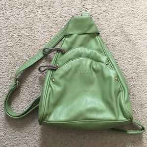 Green faux leather backpack